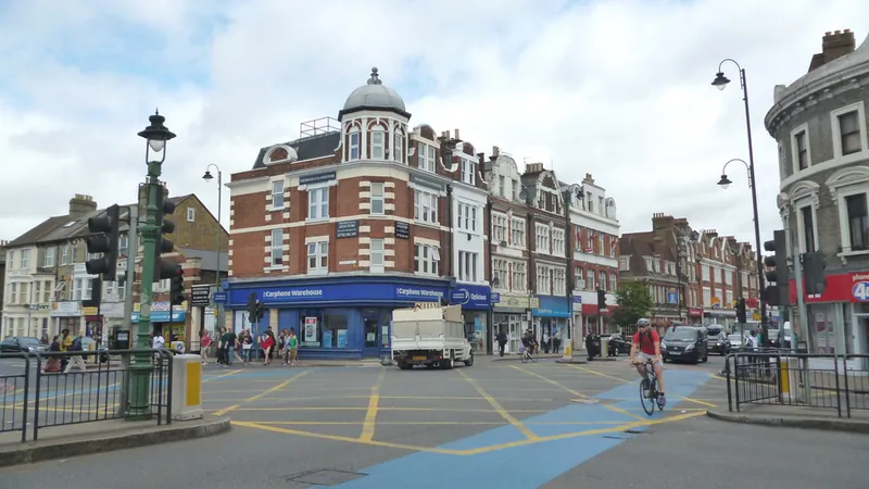 Busy intersection beside Tooting Broadway Underground station
